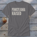 Gray t-shirt with "PENNSYLVANIA RAISED" text in white.