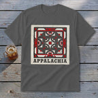 A dark gray t-shirt with a square red, white, and black geometric quilt design and the word Appalachia.