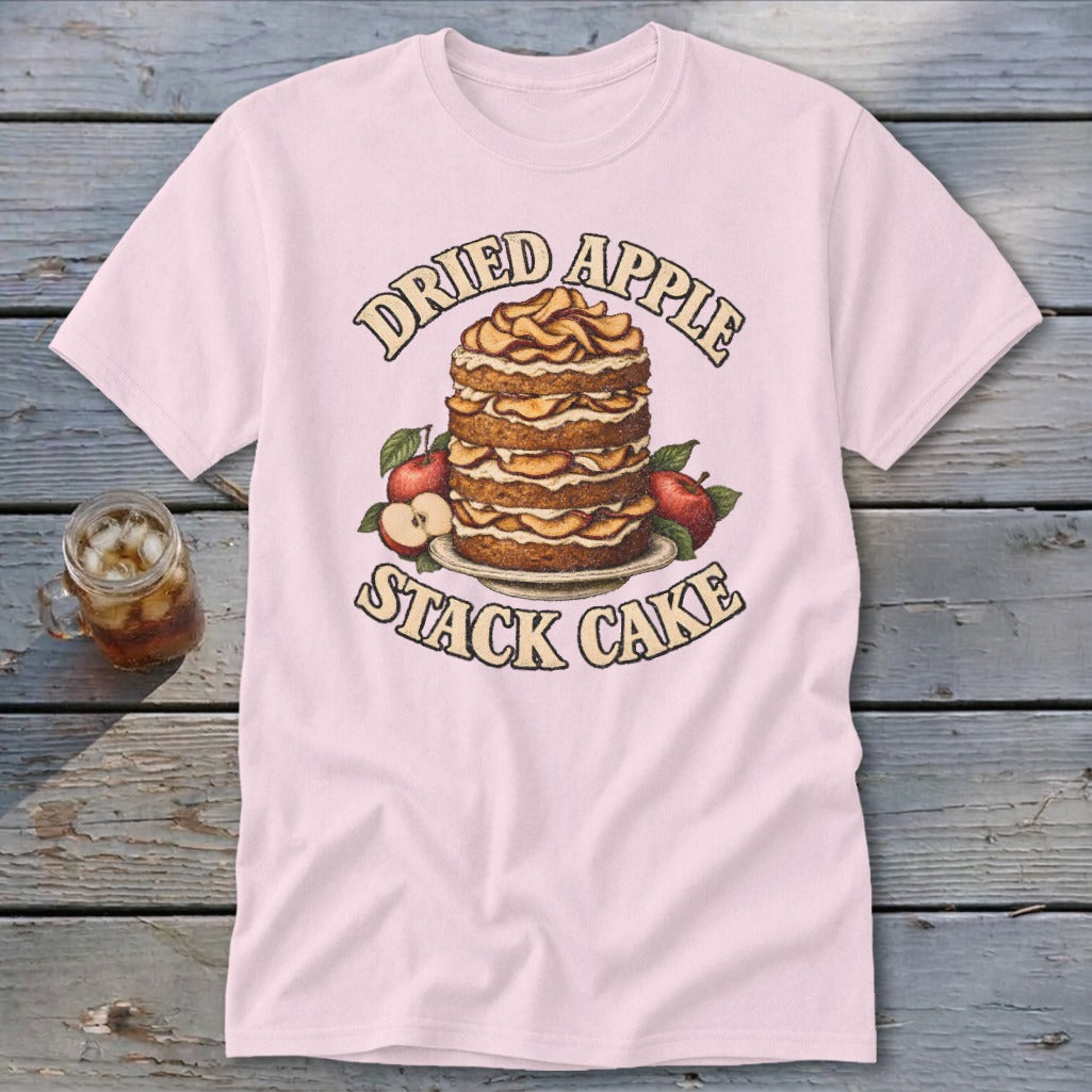 Pink t-shirt with "Dried Apple Stack Cake" graphic featuring a multi-layered cake and apples.