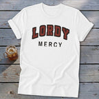 White t-shirt with "LORDY MERCY" text in distressed red and black lettering.