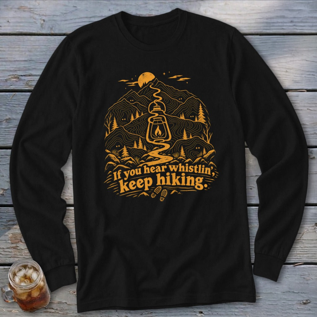 Black long-sleeve shirt with orange mountain landscape graphic and text.