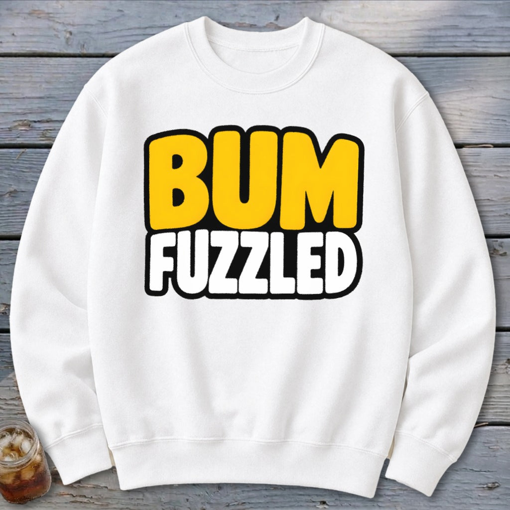 A white crewneck sweatshirt featuring the text BUM FUZZLED printed in bold yellow and white letters.