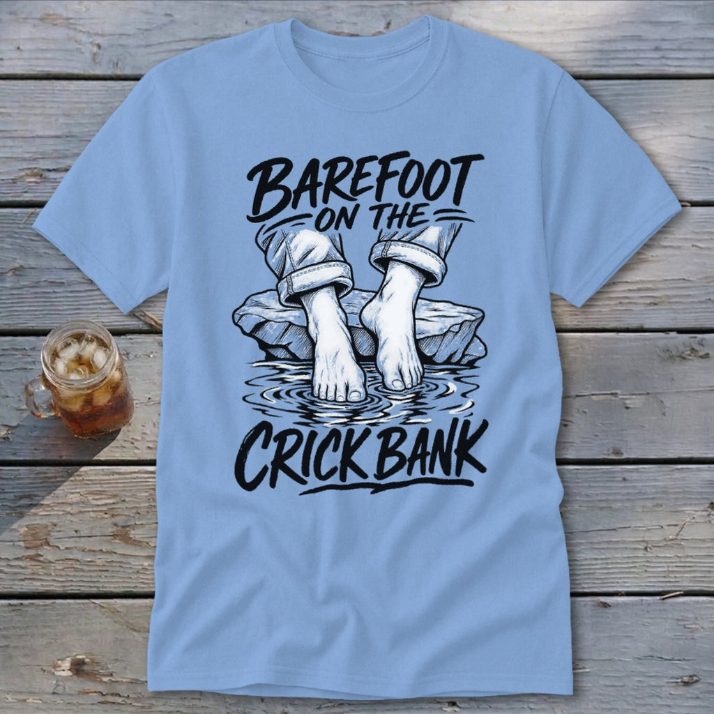 Light blue t-shirt with "BAREFOOT ON THE CRICK BANK" text and graphic.
