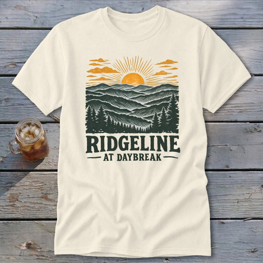 Cream t-shirt with a vintage landscape design and text "RIDGELINE AT DAYBREAK".