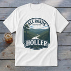 White t-shirt with a graphic featuring a winding road through mountains and text "ALL ROADS LEAD TO THE HOLLER".
