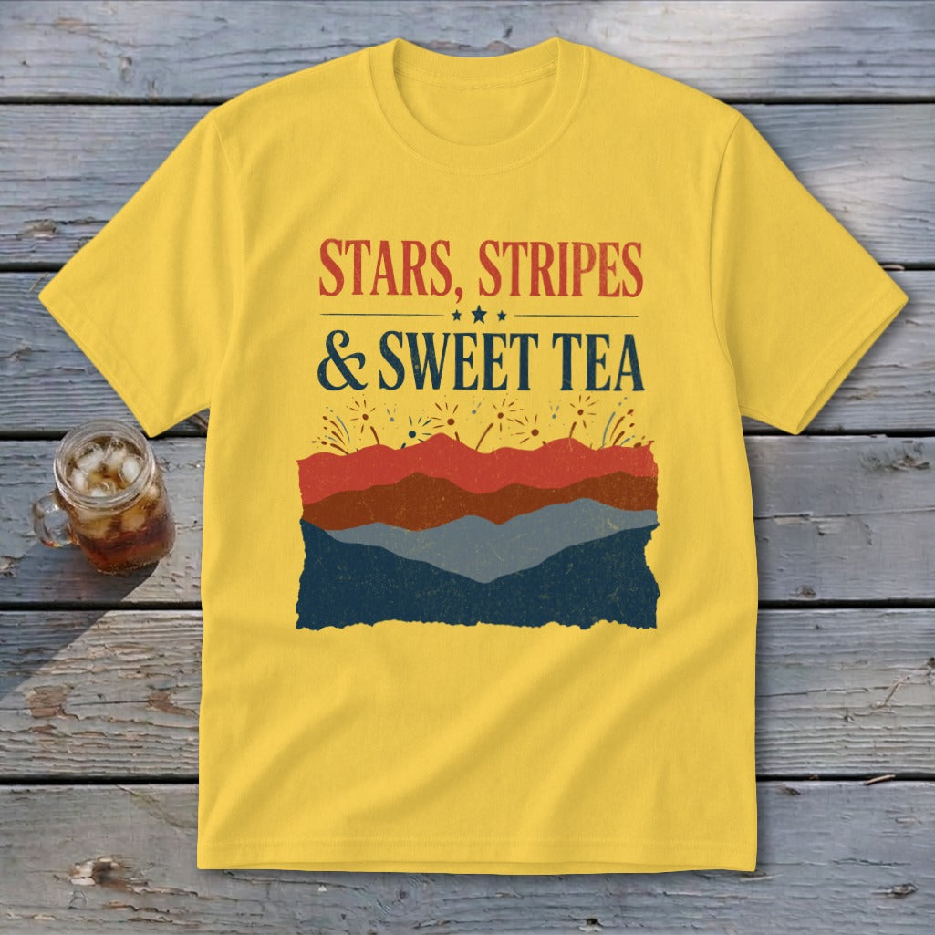 Yellow crewneck t-shirt featuring the text STARS, STRIPES & SWEET TEA above layered mountain graphics.