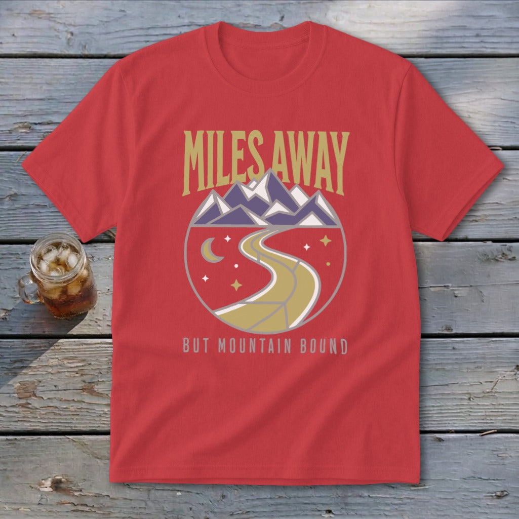 Red t-shirt with "Miles Away But Mountain Bound" text and mountain graphic.