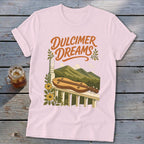 Pink t-shirt with "Dulcimer Dreams" text and a dulcimer on a porch.
