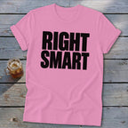 Pink t-shirt with black text "RIGHT SMART" and a glass of iced tea.