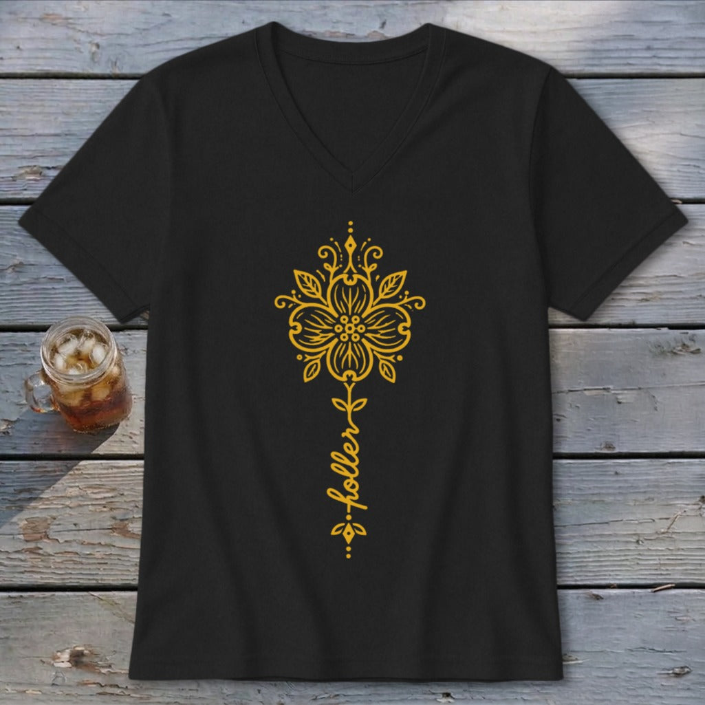 Black v-neck t-shirt with a yellow floral design and the word "holler".