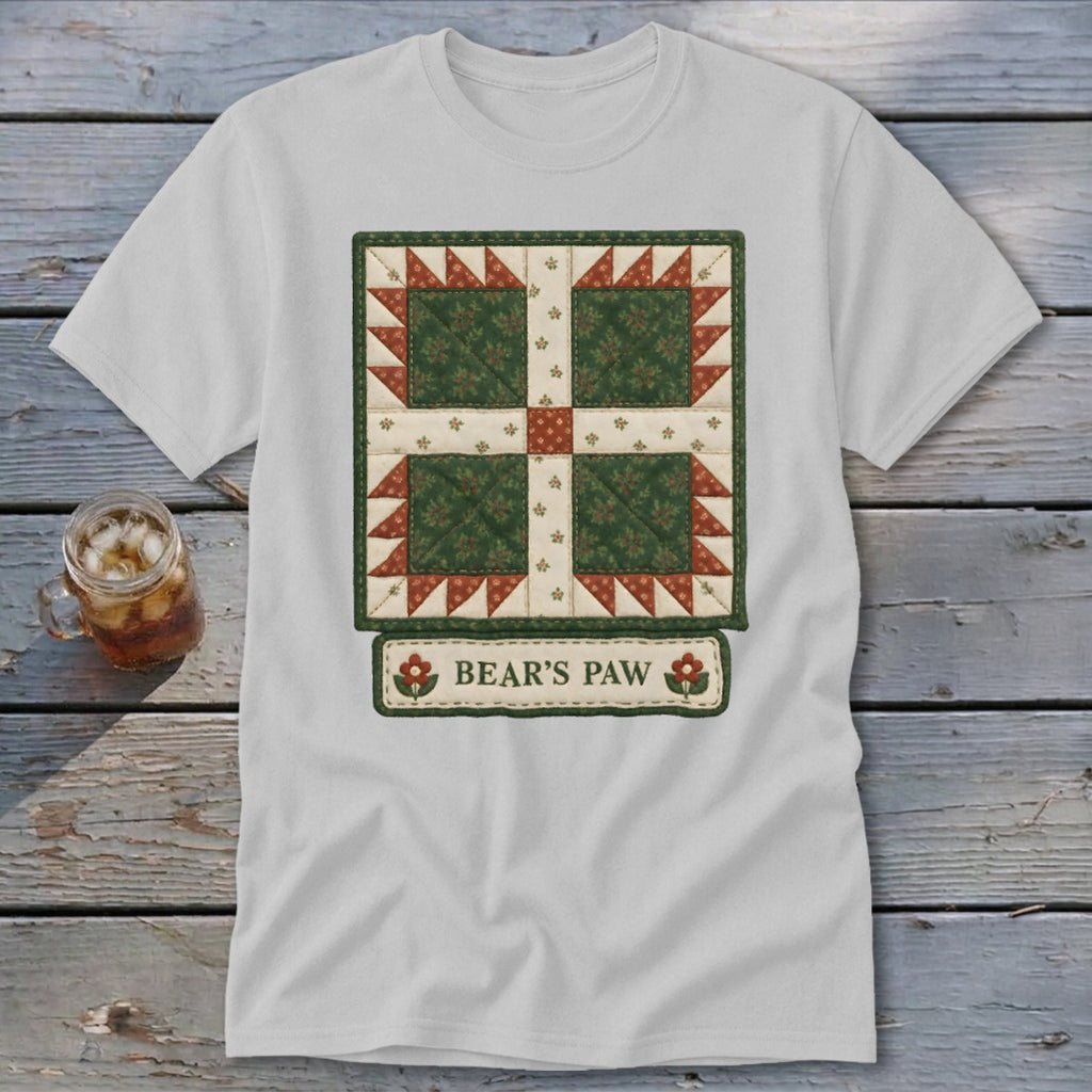 White t-shirt with a square quilt block design labeled "BEAR'S PAW".