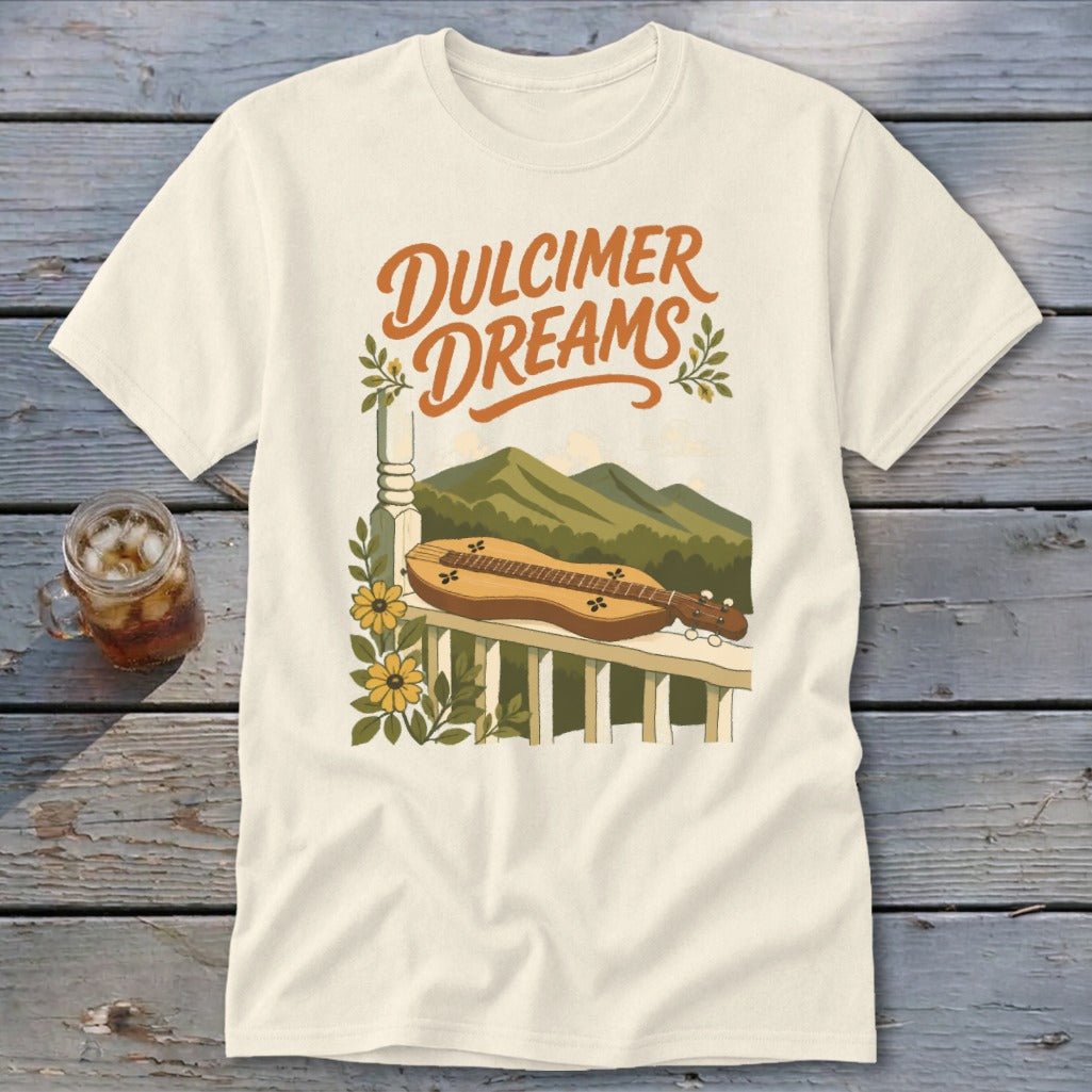 Cream t-shirt with "Dulcimer Dreams" text and a dulcimer on a porch railing.