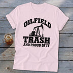 Pink t-shirt with black "Oilfield Trash and Proud of It" text and pumpjack graphic.
