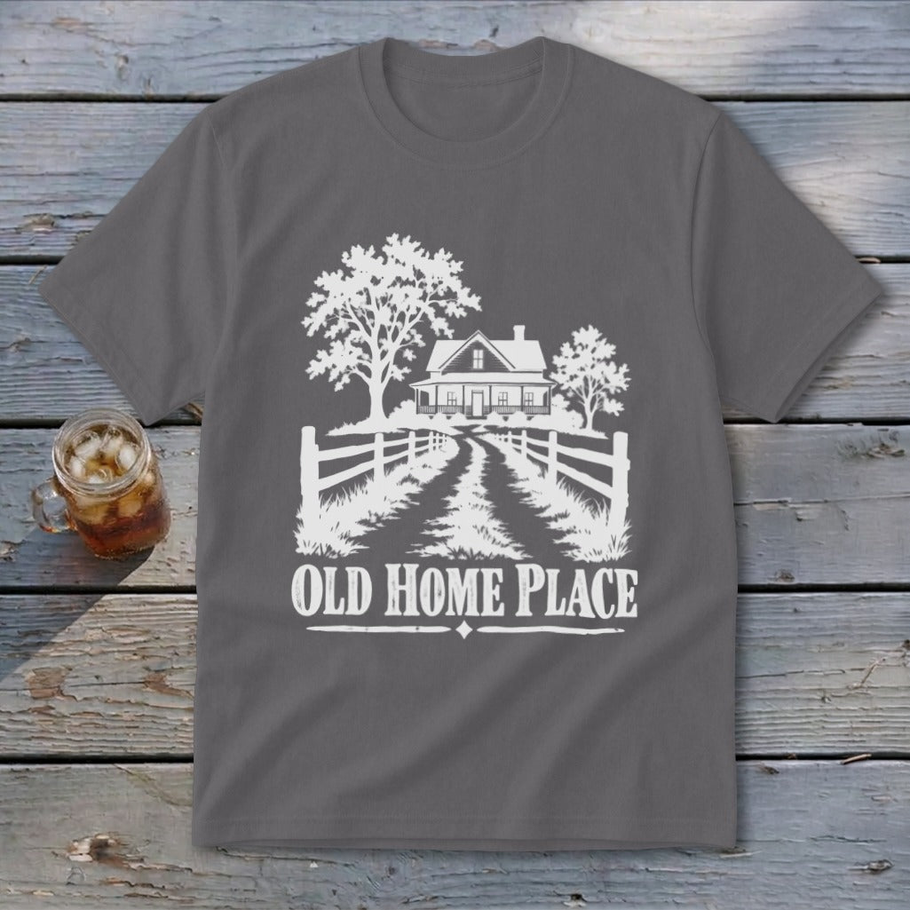 T-shirt with white graphic of a farmhouse, trees, fence, and "OLD HOME PLACE" text.
