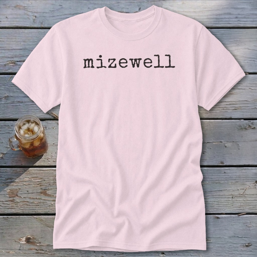 Light pink t-shirt with "mizewell" printed in black text.