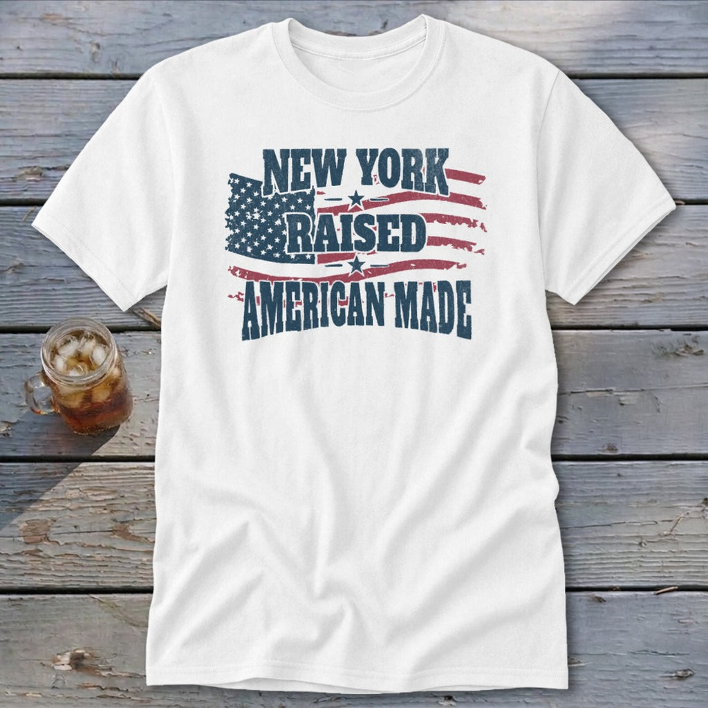White t-shirt with distressed American flag graphic and text reading New York Raised American Made.