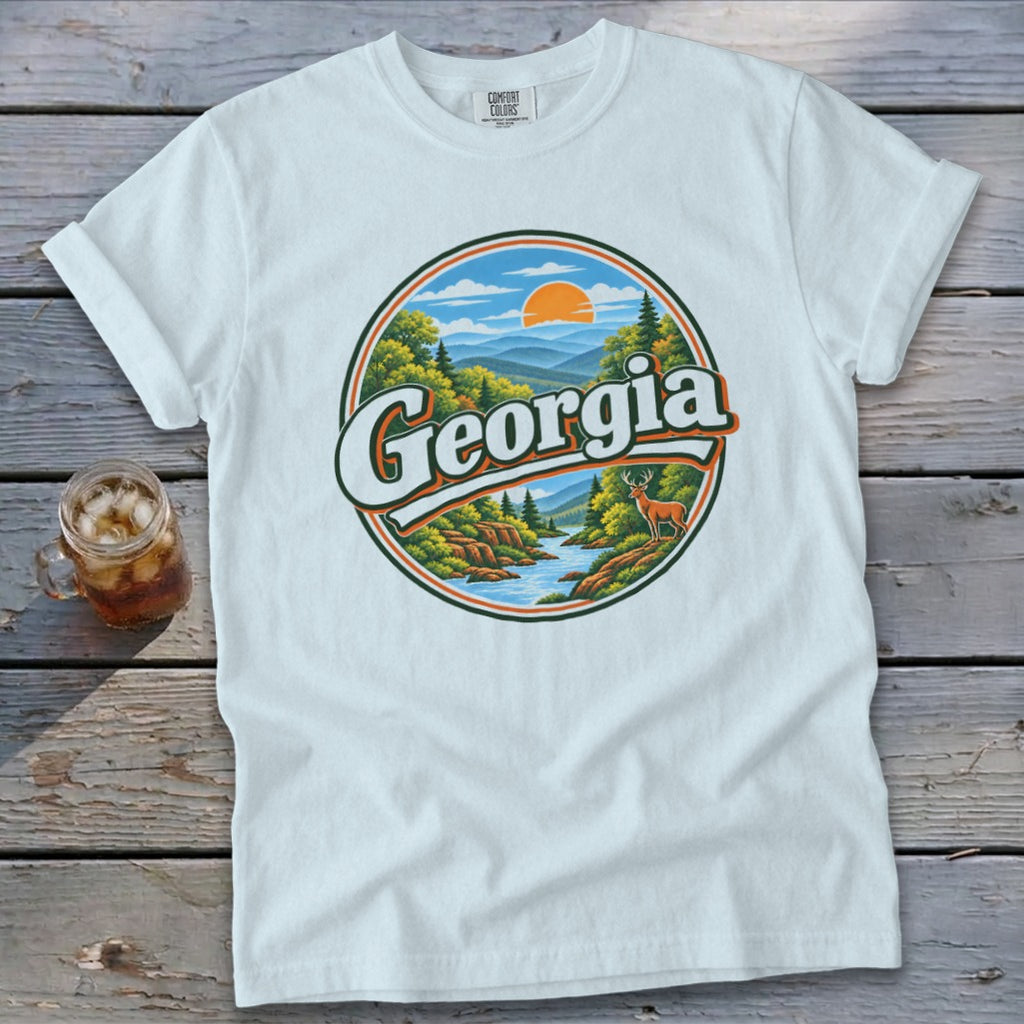 White t-shirt with "Georgia" text and scenic landscape graphic.