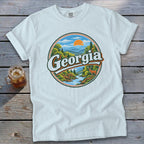 White t-shirt with "Georgia" text and scenic landscape graphic.