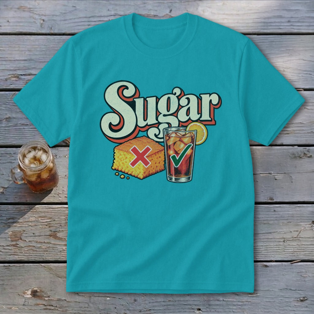 Teal t-shirt with a retro graphic of cornbread marked with a red X and iced tea marked with a green checkmark below the word Sugar.