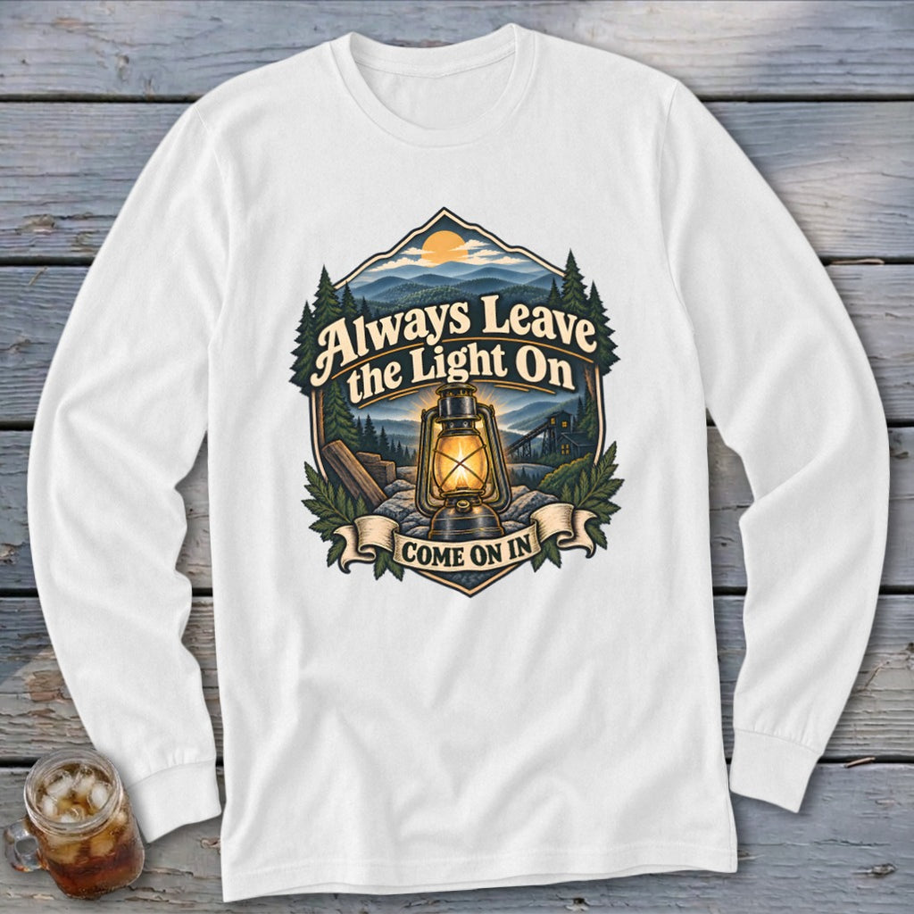 Long sleeve shirt with "Always Leave the Light On Come On In" text and lantern graphic.