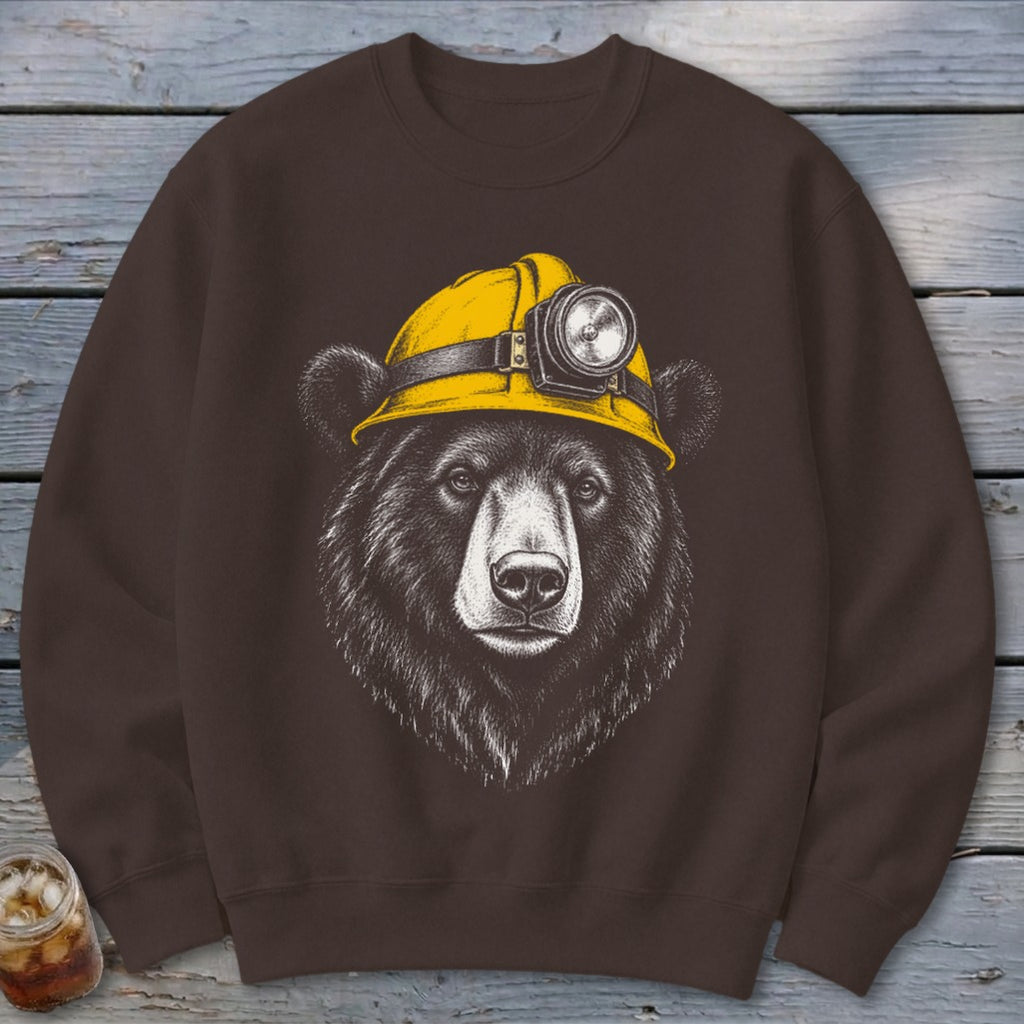 Brown sweatshirt with a sketch of a bear wearing a yellow hard hat with a headlamp.