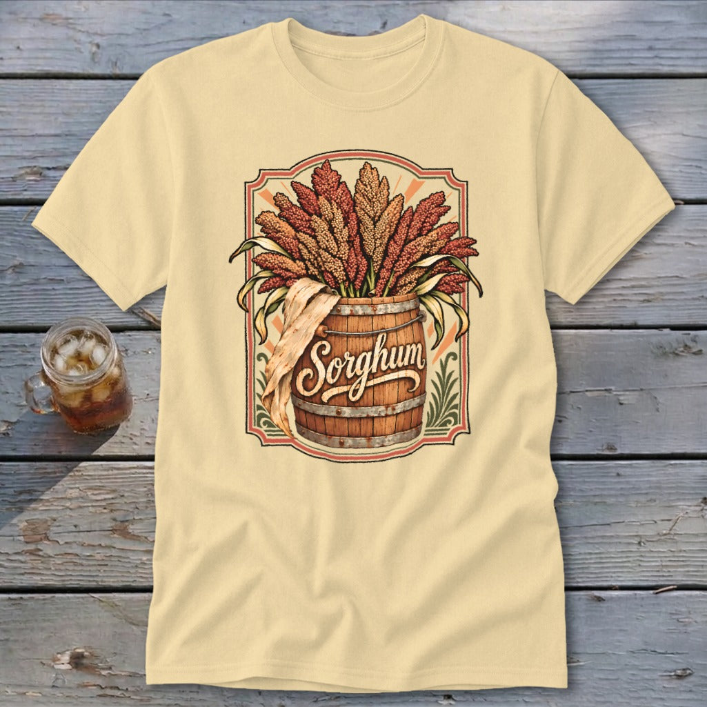 Sorghum design on a cream t-shirt with a barrel and sorghum stalks.