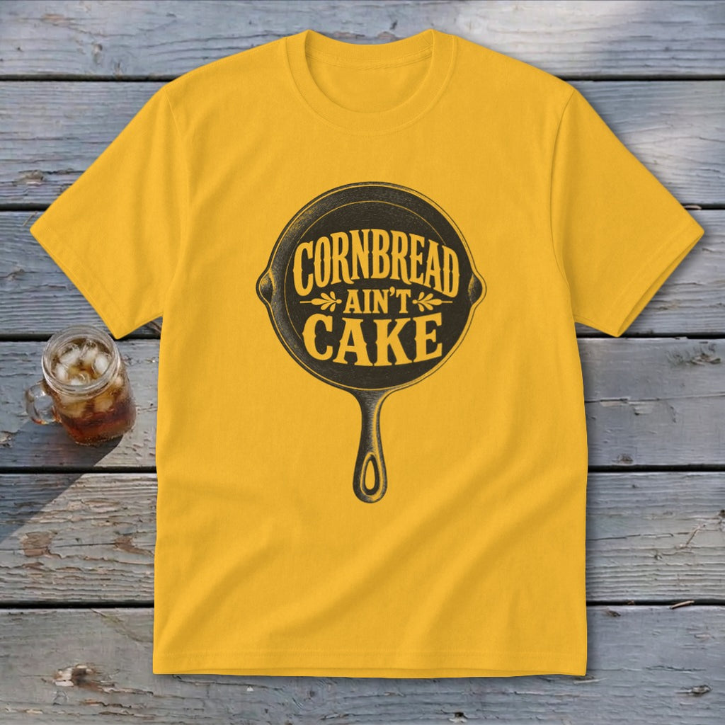 Yellow t-shirt with a black skillet graphic and "Cornbread Ain't Cake" text.