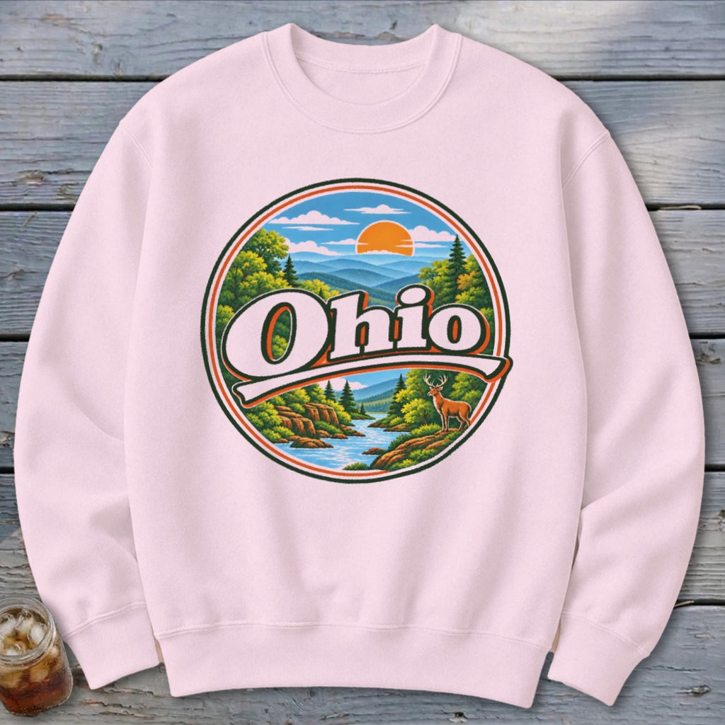 Pink sweatshirt with a circular Ohio graphic featuring a landscape, river, and deer.