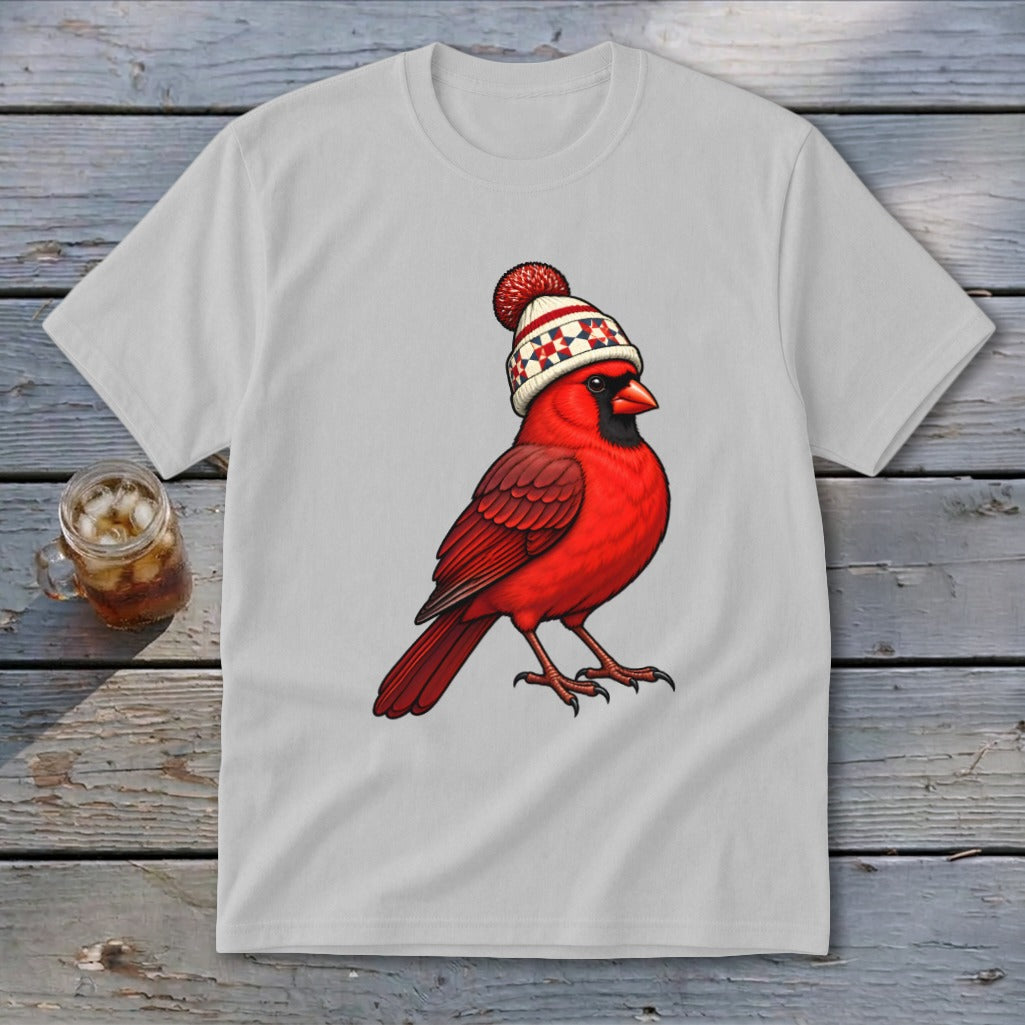 Light gray short-sleeve t-shirt featuring an illustration of a red cardinal wearing a winter hat.