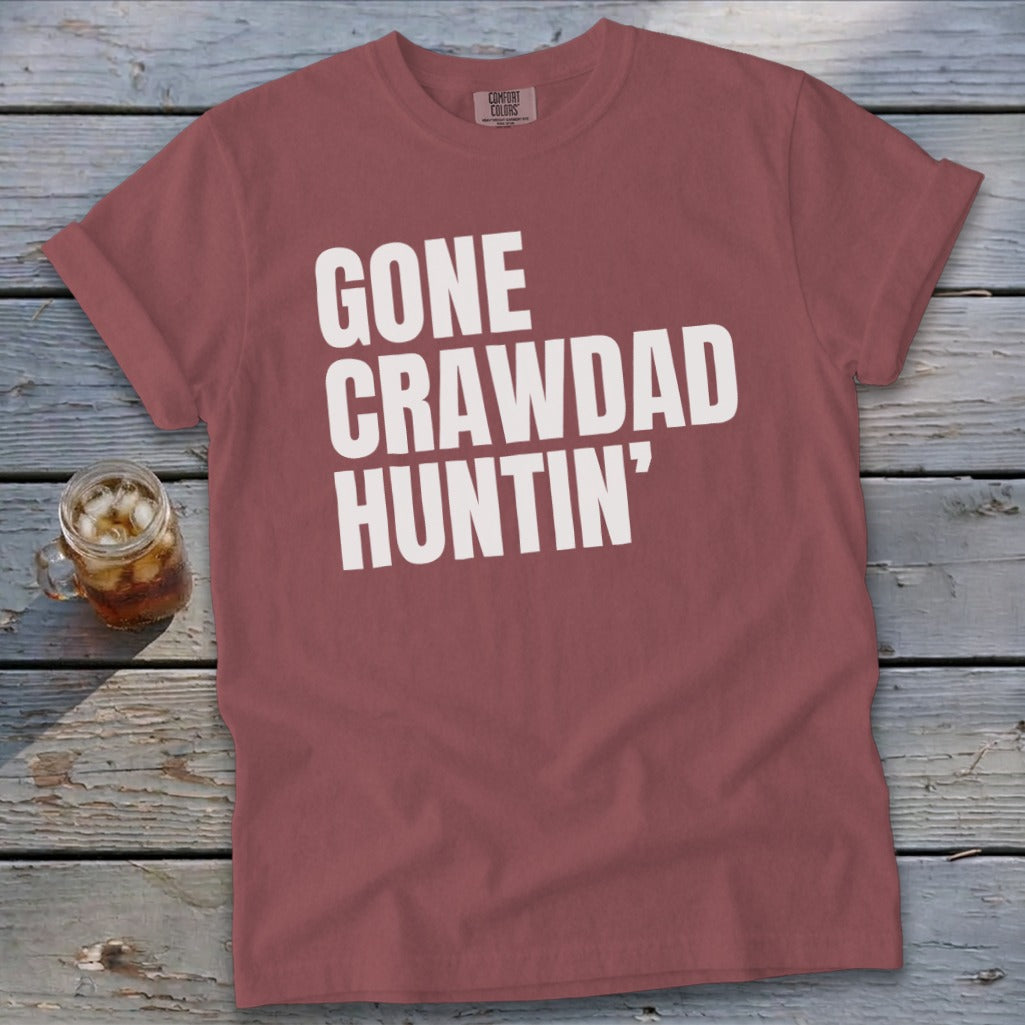 Maroon t-shirt with white text reading "GONE CRAWDAD HUNTIN'".