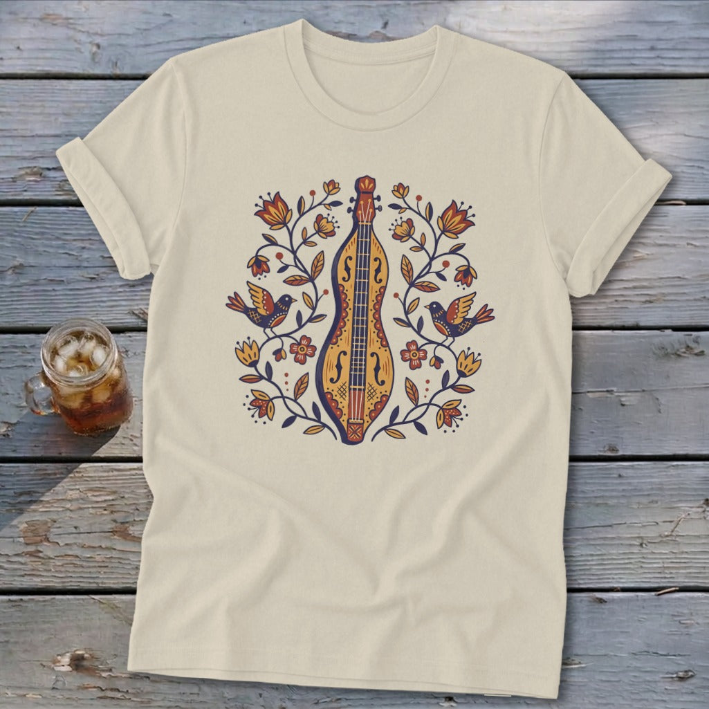 Cream t-shirt with folk art design of a lute and birds among flowers.