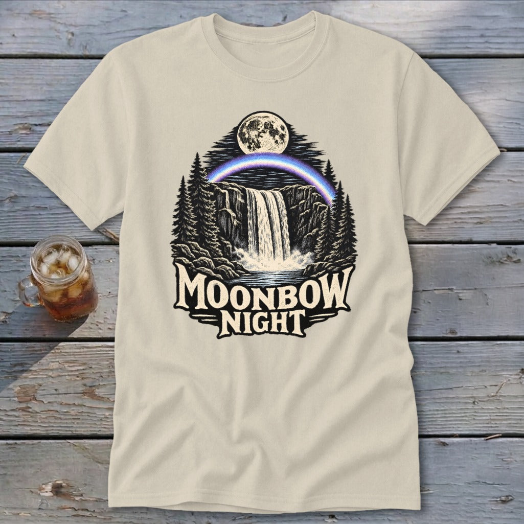 Cream t-shirt graphic featuring a waterfall, moonbow, moon, and trees with text "MOONBOW NIGHT".