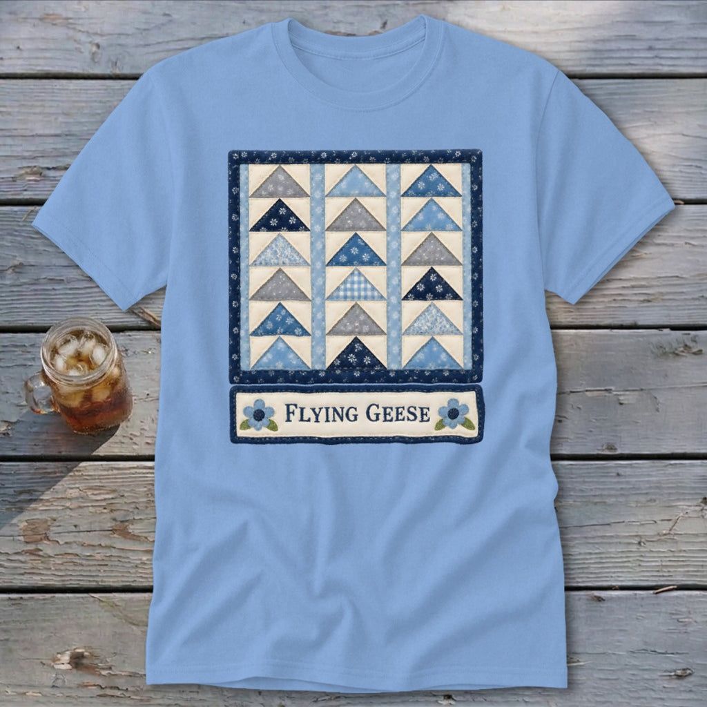 Light blue t-shirt with a framed quilt block design and the text "FLYING GEESE".