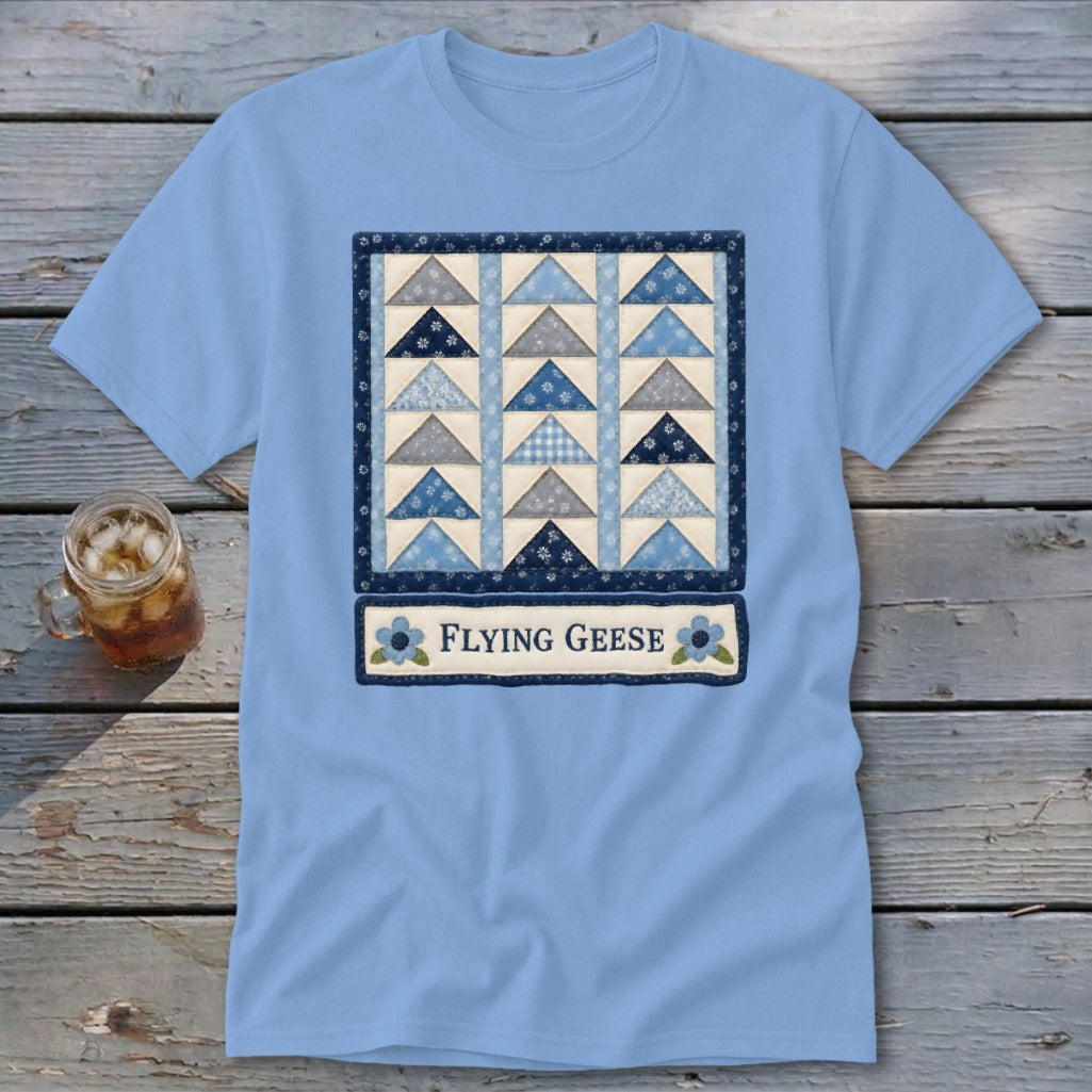 Light blue t-shirt with a framed quilt block design and the text "FLYING GEESE".