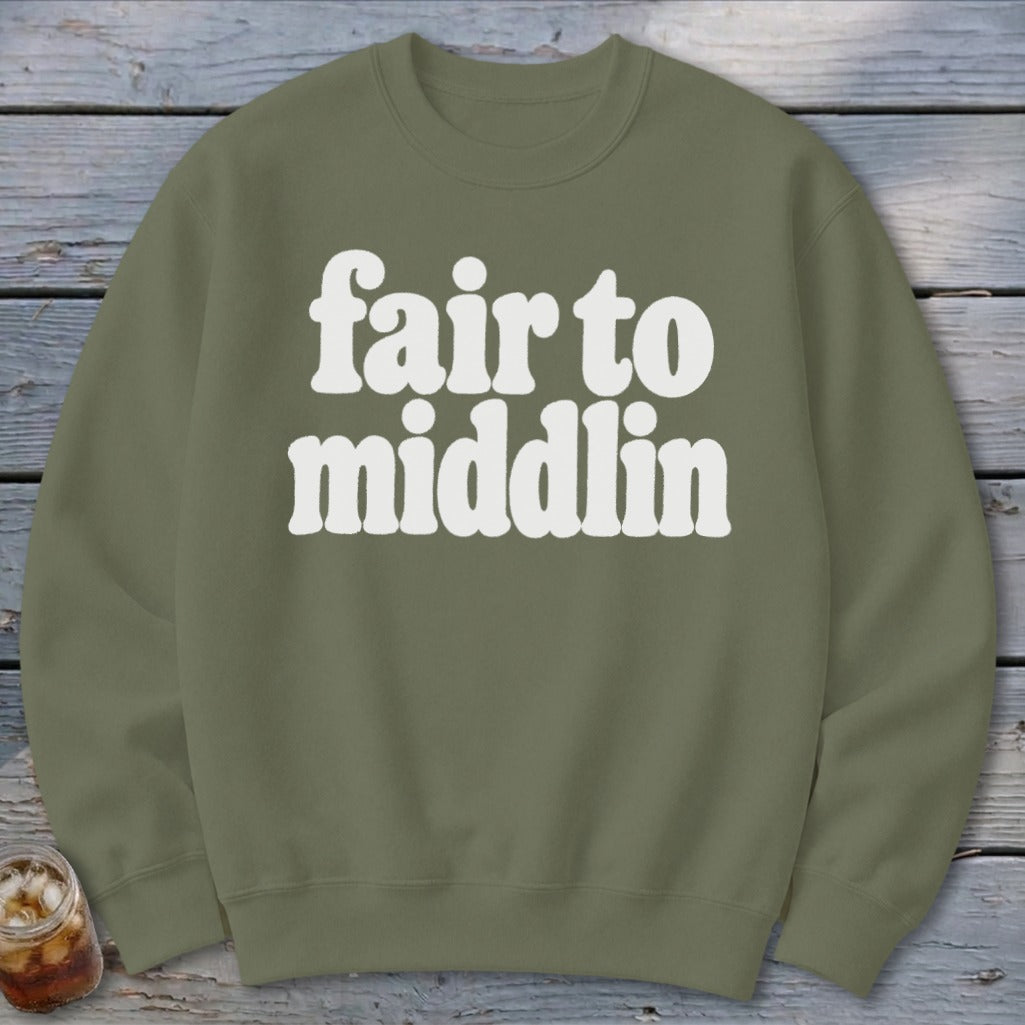 Olive green sweatshirt with white text "fair to middlin"