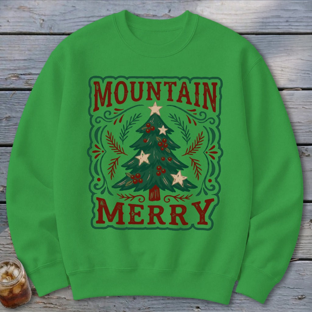 Bright green crewneck sweatshirt featuring a decorated Christmas tree graphic with the text Mountain Merry.