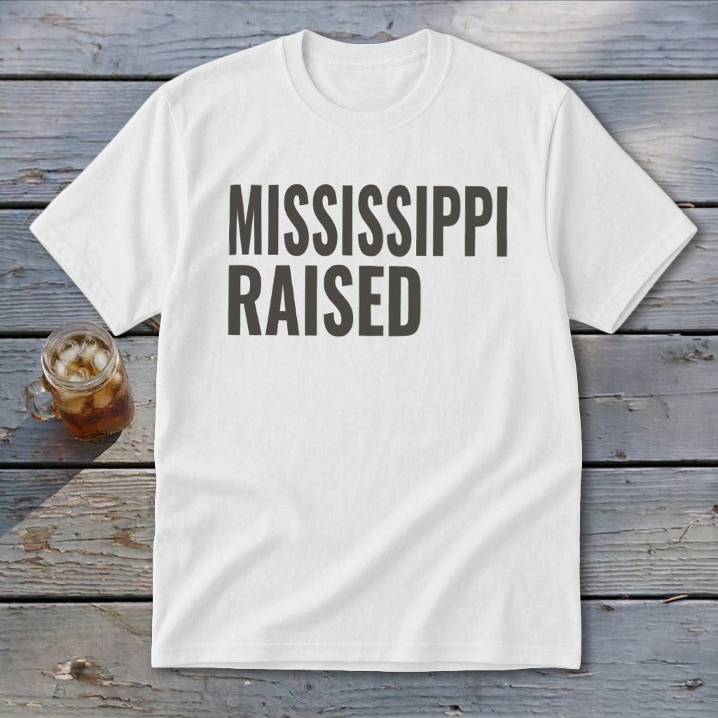 White t-shirt with "MISSISSIPPI RAISED" text in dark gray.