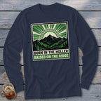 Dark blue long-sleeved shirt with a green and white graphic featuring mountains and the text BORN IN THE HOLLER RAISED ON THE RIDGE.