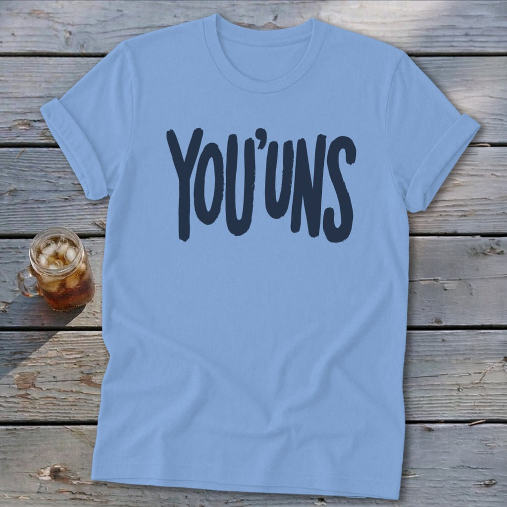 Light blue t-shirt with dark blue text reading "YOU'UNS".