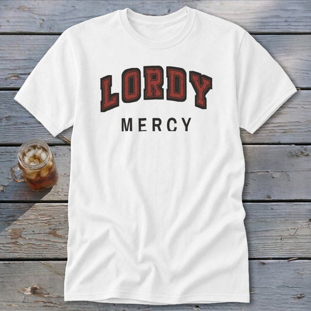 White t-shirt with "LORDY MERCY" text printed in red and black lettering.