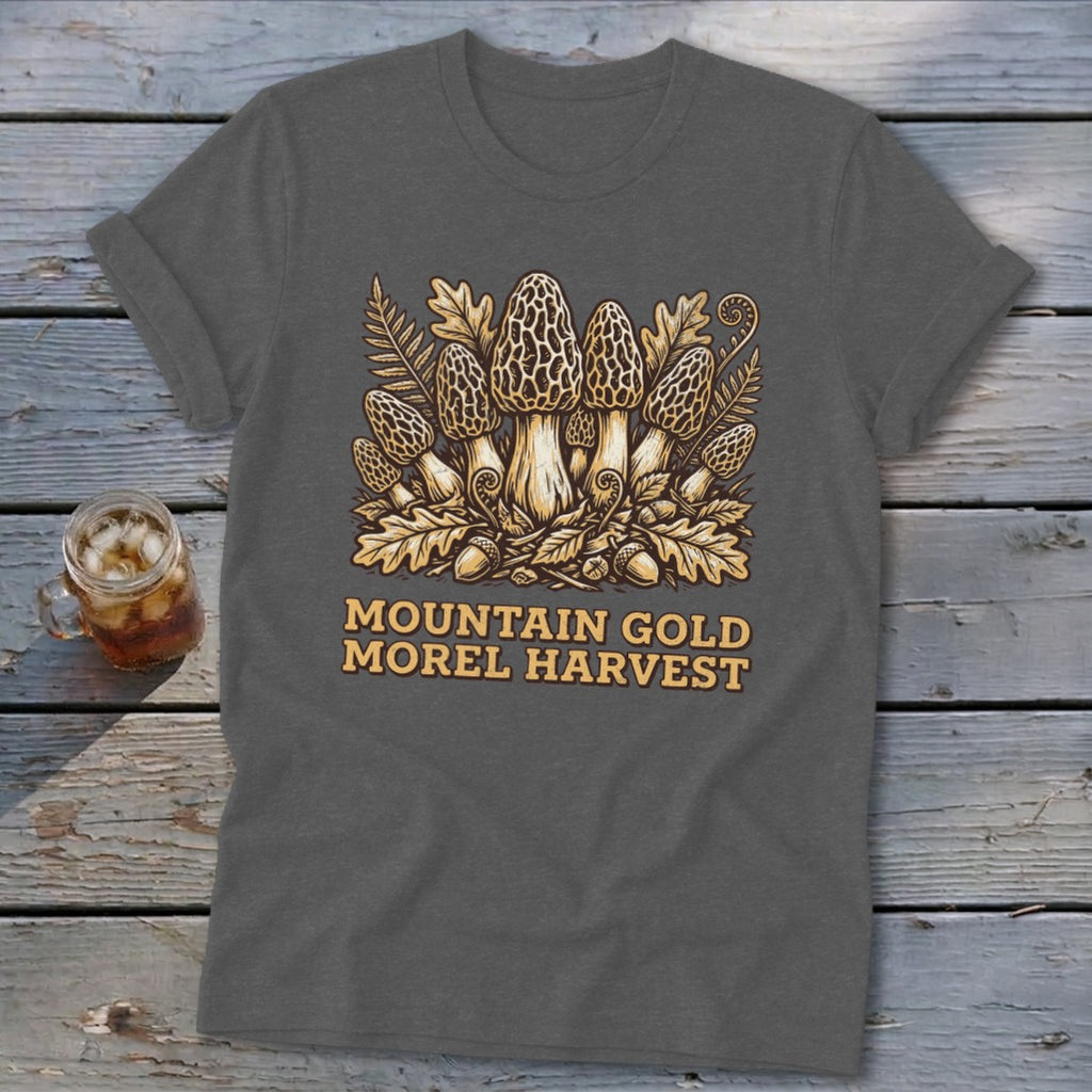 T-shirt with "Mountain Gold Morel Harvest" text and morel mushrooms and oak leaves graphic.