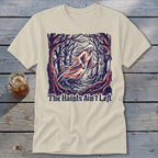 Cream t-shirt with ghost in forest graphic and text "The Haints Ain't Left."