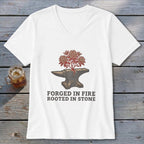 White v-neck t-shirt with anvil, flowering branches, and text "Forged in Fire Rooted in Stone".