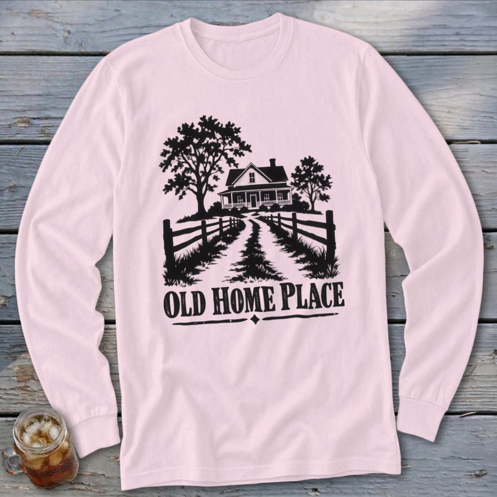 Pink long-sleeve shirt with "Old Home Place" graphic featuring a house and trees.