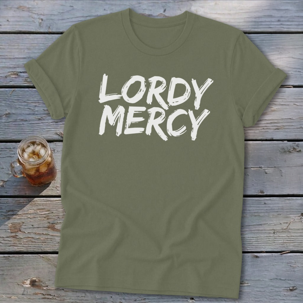 Olive green t-shirt with white "LORDY MERCY" text and glass of iced drink.