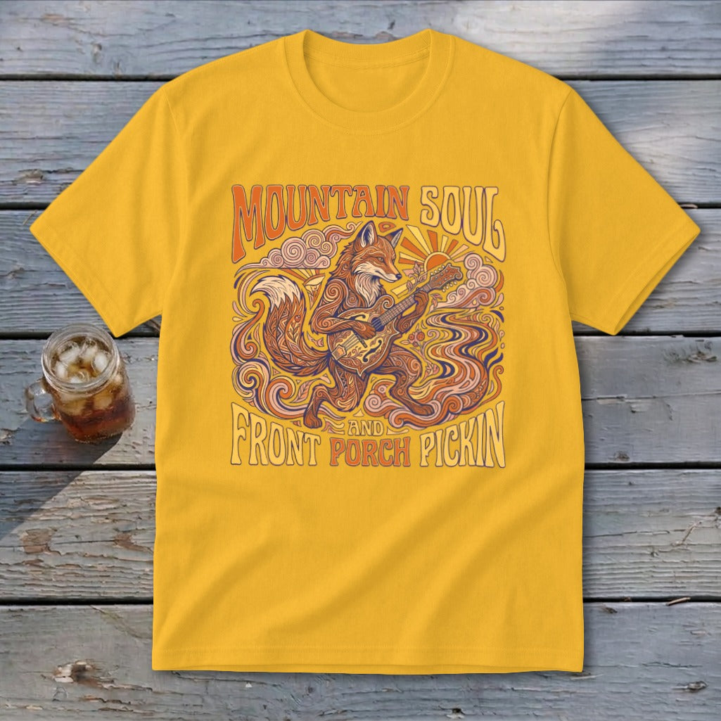 Yellow t-shirt with a stylized fox playing a guitar, text "Mountain Soul and Front Porch Pickin'".