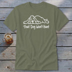 An olive green t-shirt with white text reading That Dog Won't Hunt below a sleeping dog graphic.
