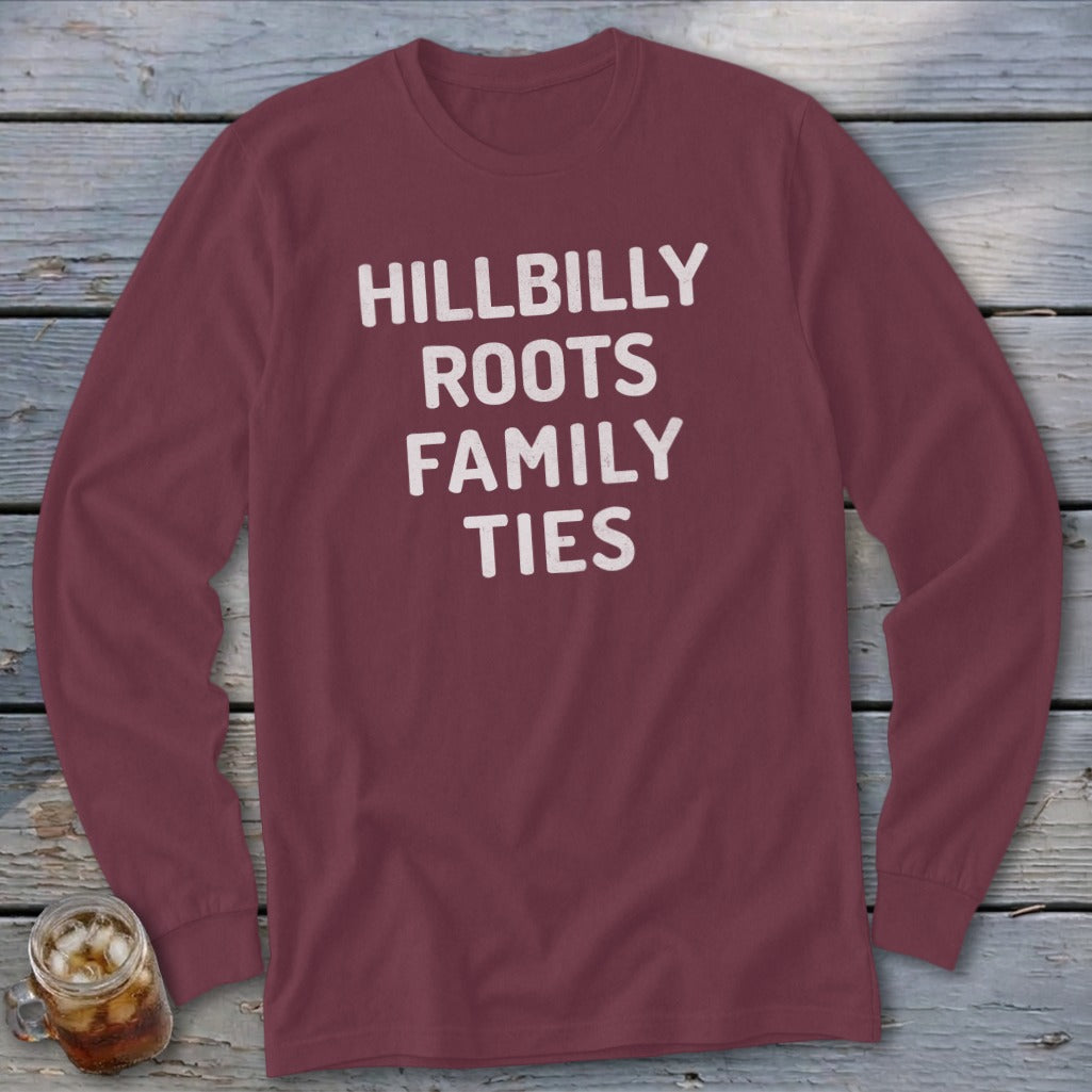 Maroon long sleeve shirt with white text reading "HILLBILLY ROOTS FAMILY TIES".