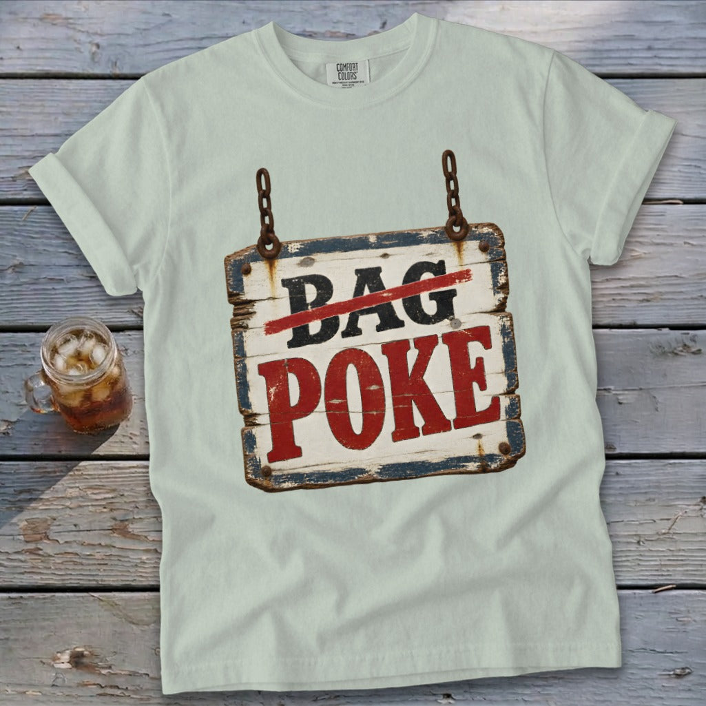 A light green t-shirt displays a graphic of a rustic wooden sign reading BAG POKE.
