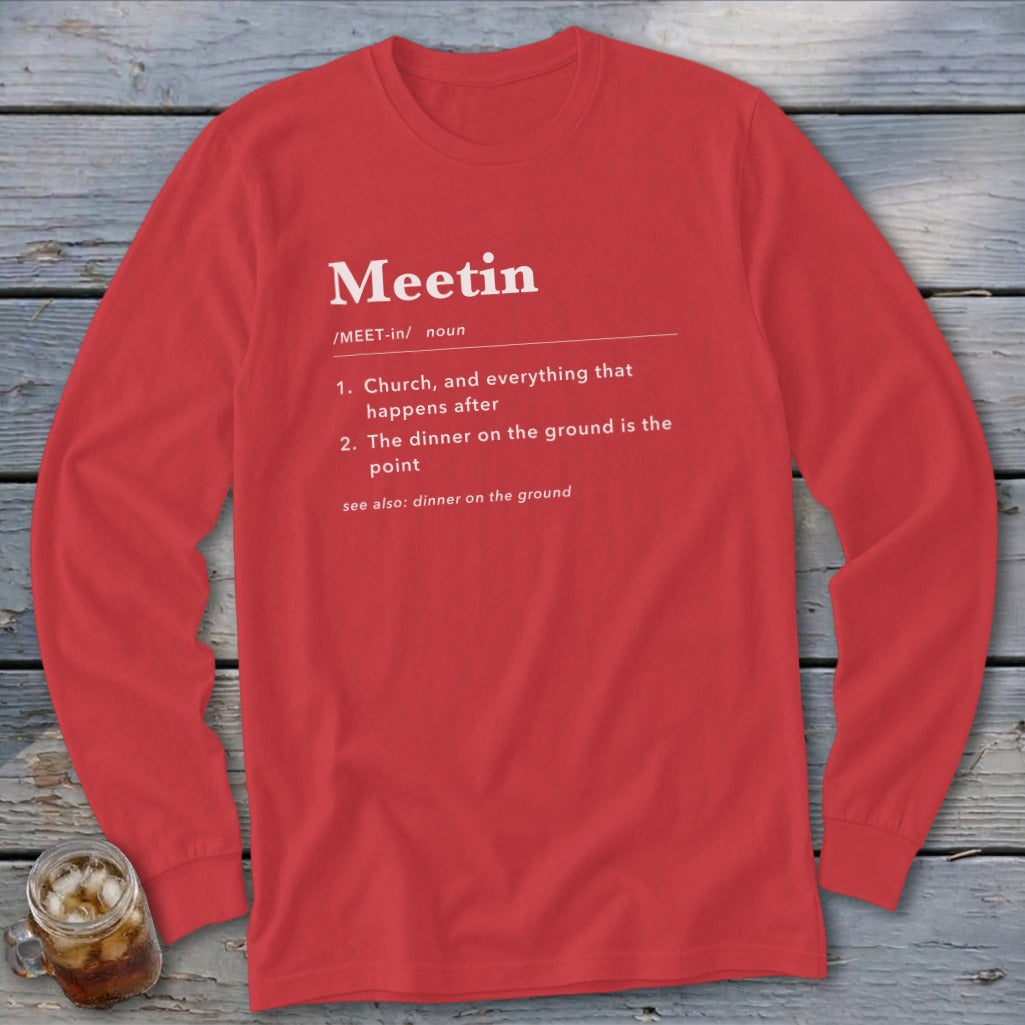 Red long-sleeve shirt with "Meetin" definition printed in white text.